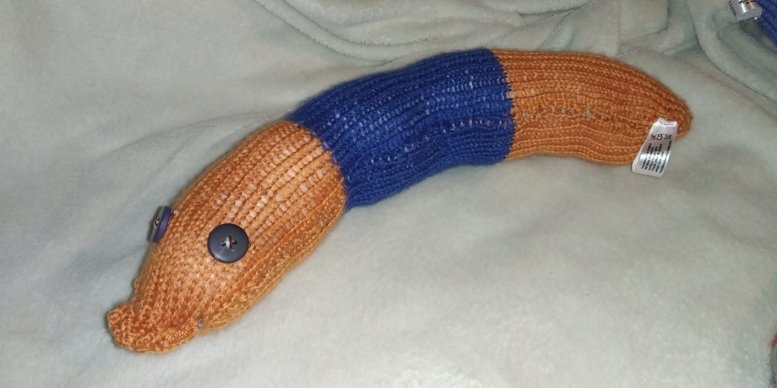Denzel the Tan and Dark Blue Banded Chunky Short Snake.