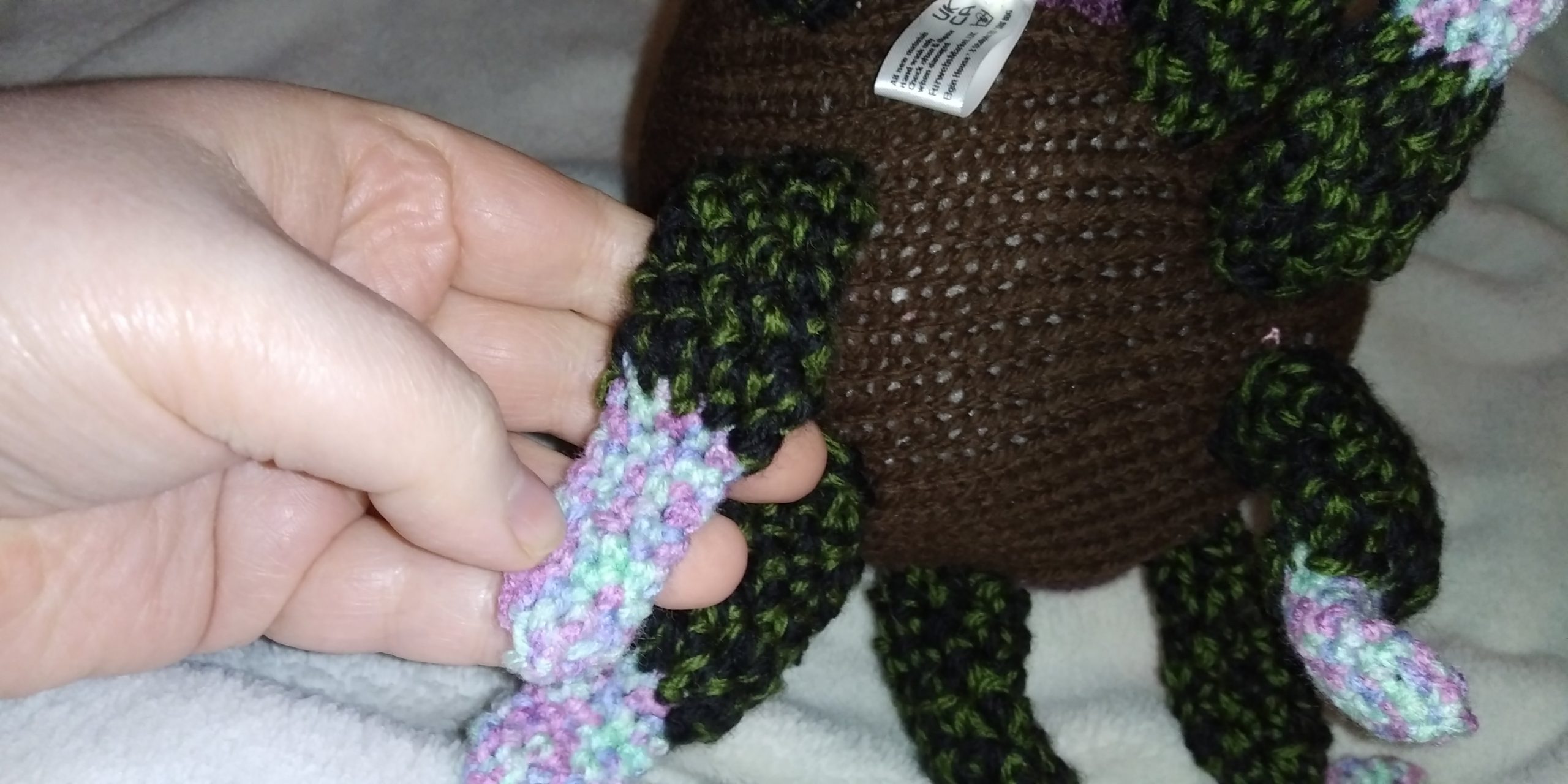 Tomichai the Purple and Brown with Black Green Rainbow Feelers Octopus - Image 3